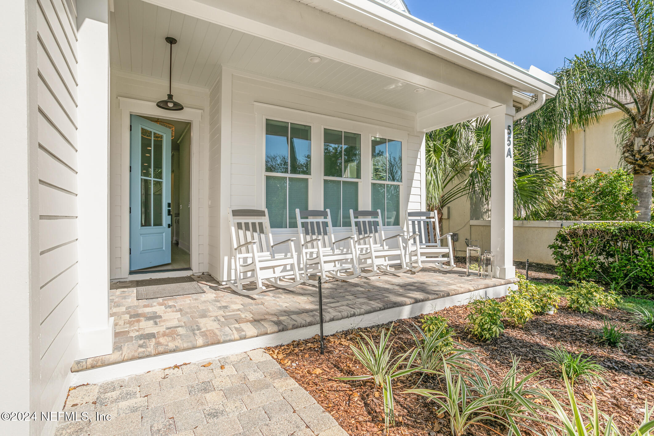 55 A Solana Road Ponte Vedra Beach, FL 32082 - Photo 6 of 42 a view of a backyard with a garden and plants