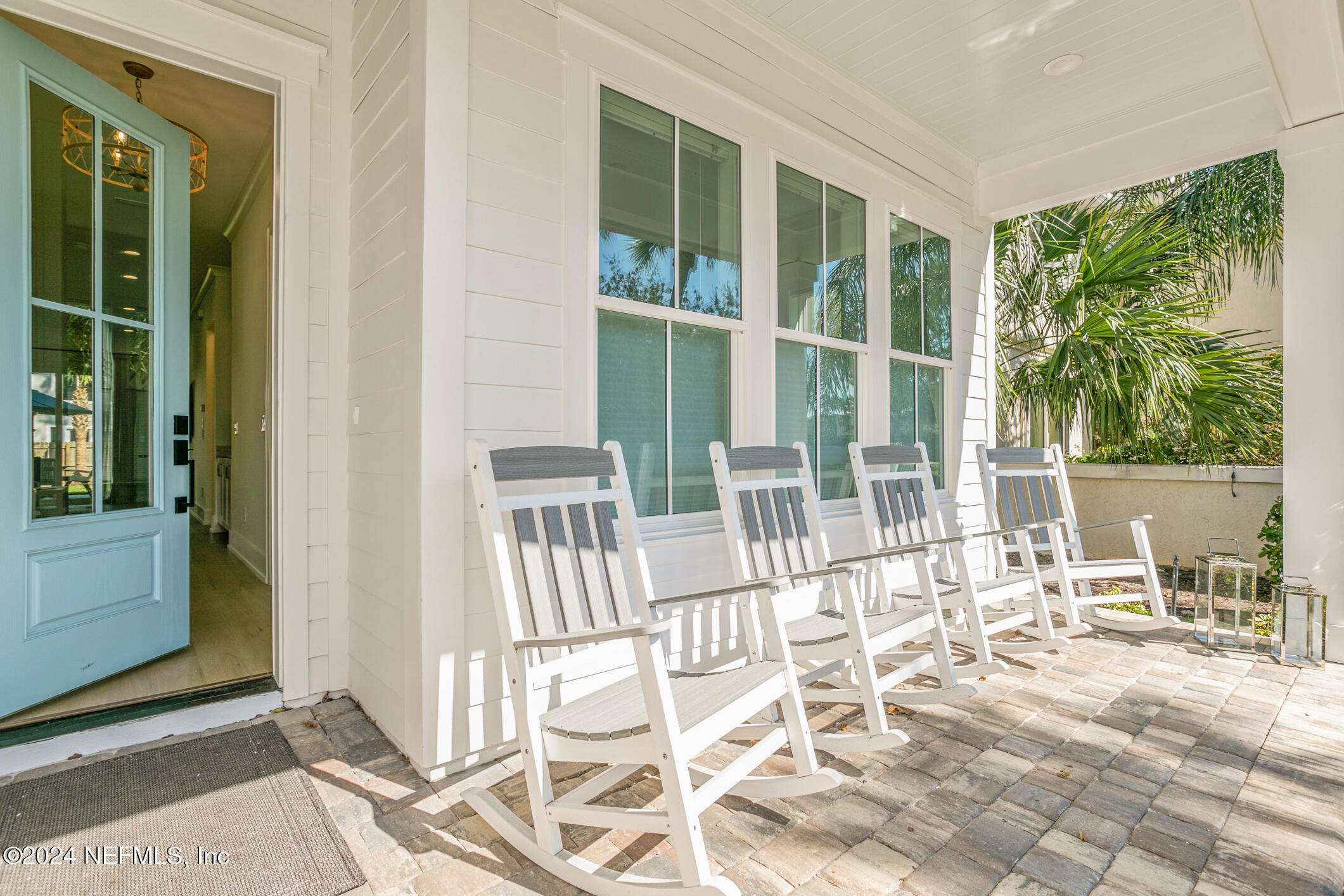 55 A Solana Road Ponte Vedra Beach, FL 32082 - Photo 7 of 42 a view of a chair and table in a patio