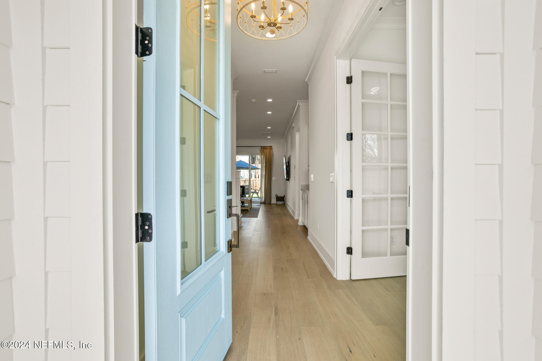55 A Solana Road Ponte Vedra Beach, FL 32082 - Photo 8 of 42 view of a hallway with wooden floor