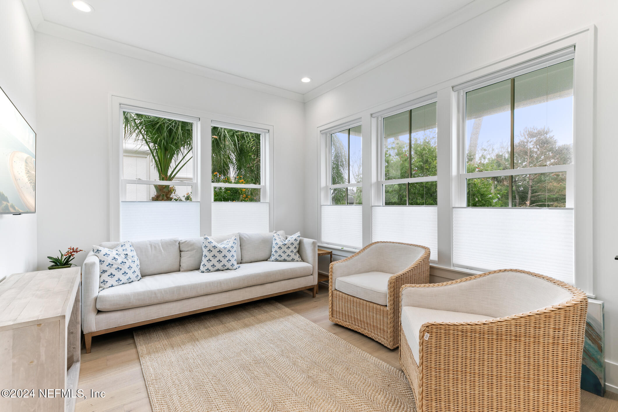55 A Solana Road Ponte Vedra Beach, FL 32082 - Photo 10 of 42 a living room with furniture and a large window