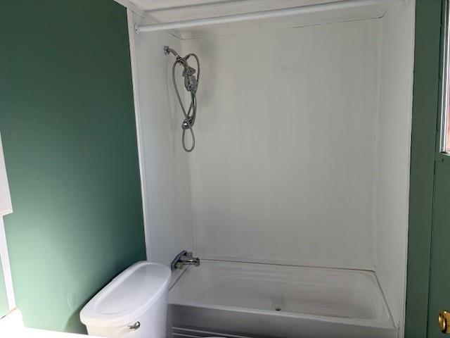 110 County Road Brookston, TX 75421 - Photo 14 of 14 a bathroom with a toilet and a bath tub