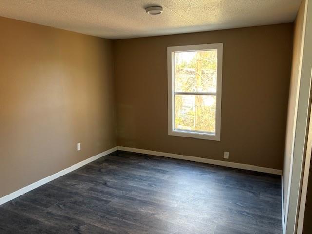 110 County Road Brookston, TX 75421 - Photo 6 of 14 a view of an empty room with wooden floor and a window
