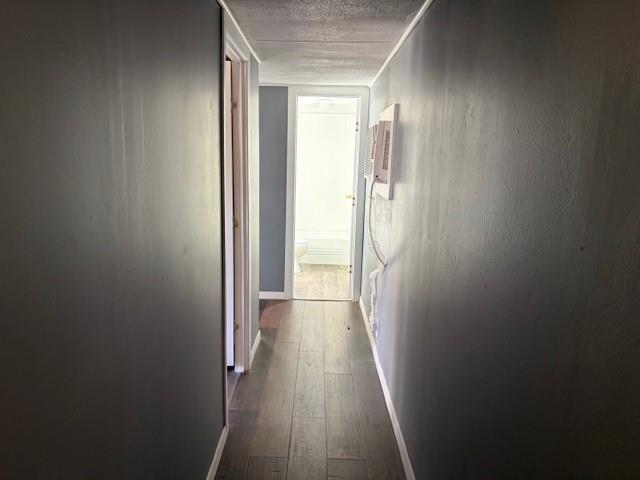 110 County Road Brookston, TX 75421 - Photo 7 of 14 a view of a hallway with wooden floor