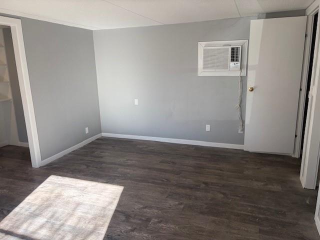 110 County Road Brookston, TX 75421 - Photo 8 of 14 an empty room with wooden floor and windows