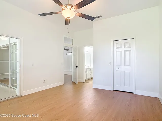 a bathroom with a double vanity sink and mirror
