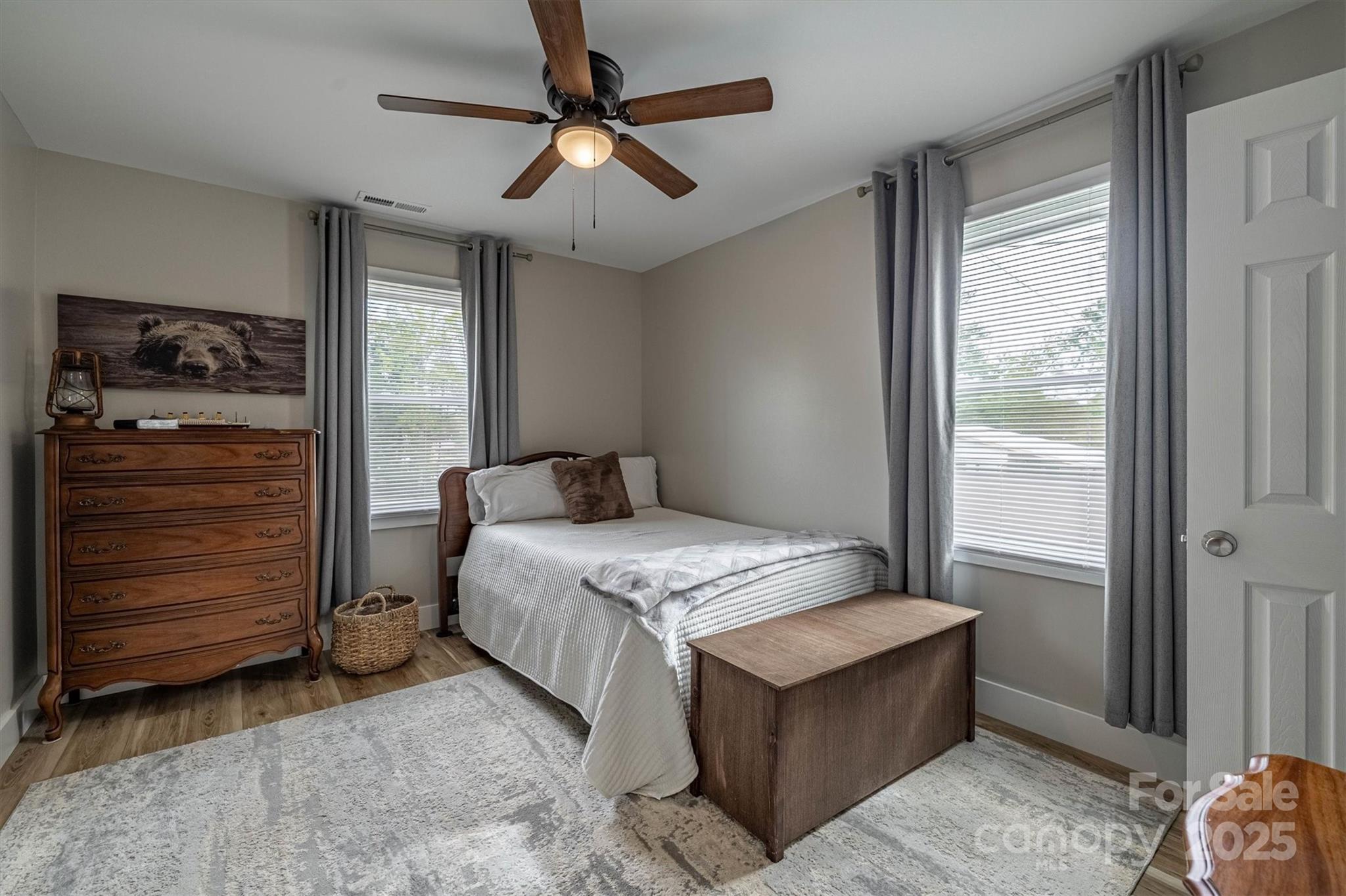 2625 20th St Lane Northeast Hickory, NC 28601 - Photo 25 of 31 a bedroom with a bed and a dresser