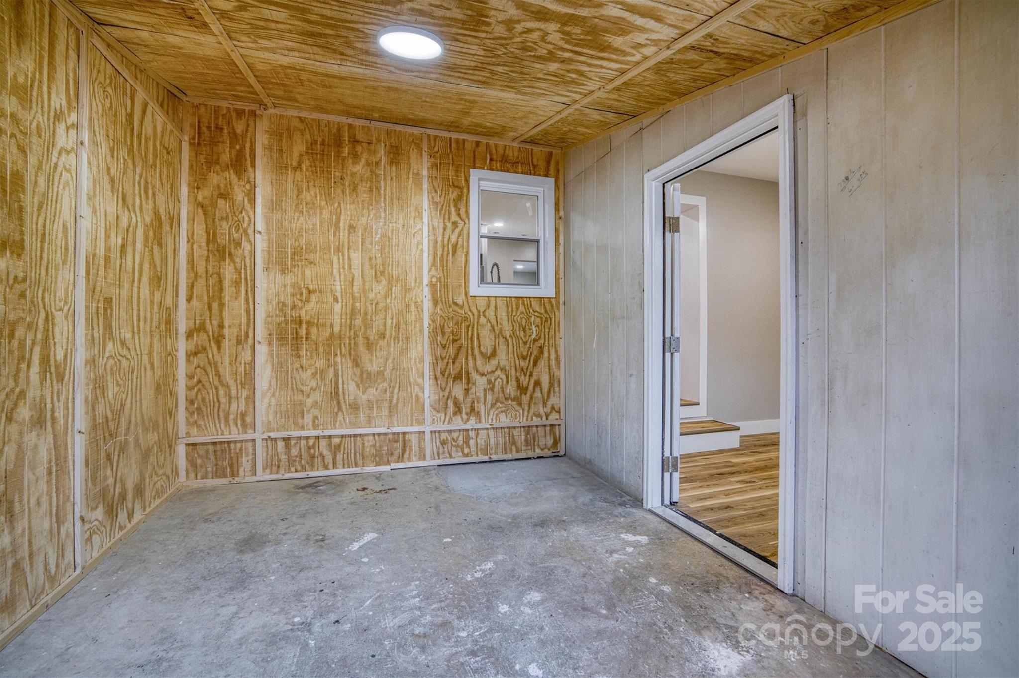 2625 20th St Lane Northeast Hickory, NC 28601 - Photo 30 of 31 a view of an empty room with wooden door