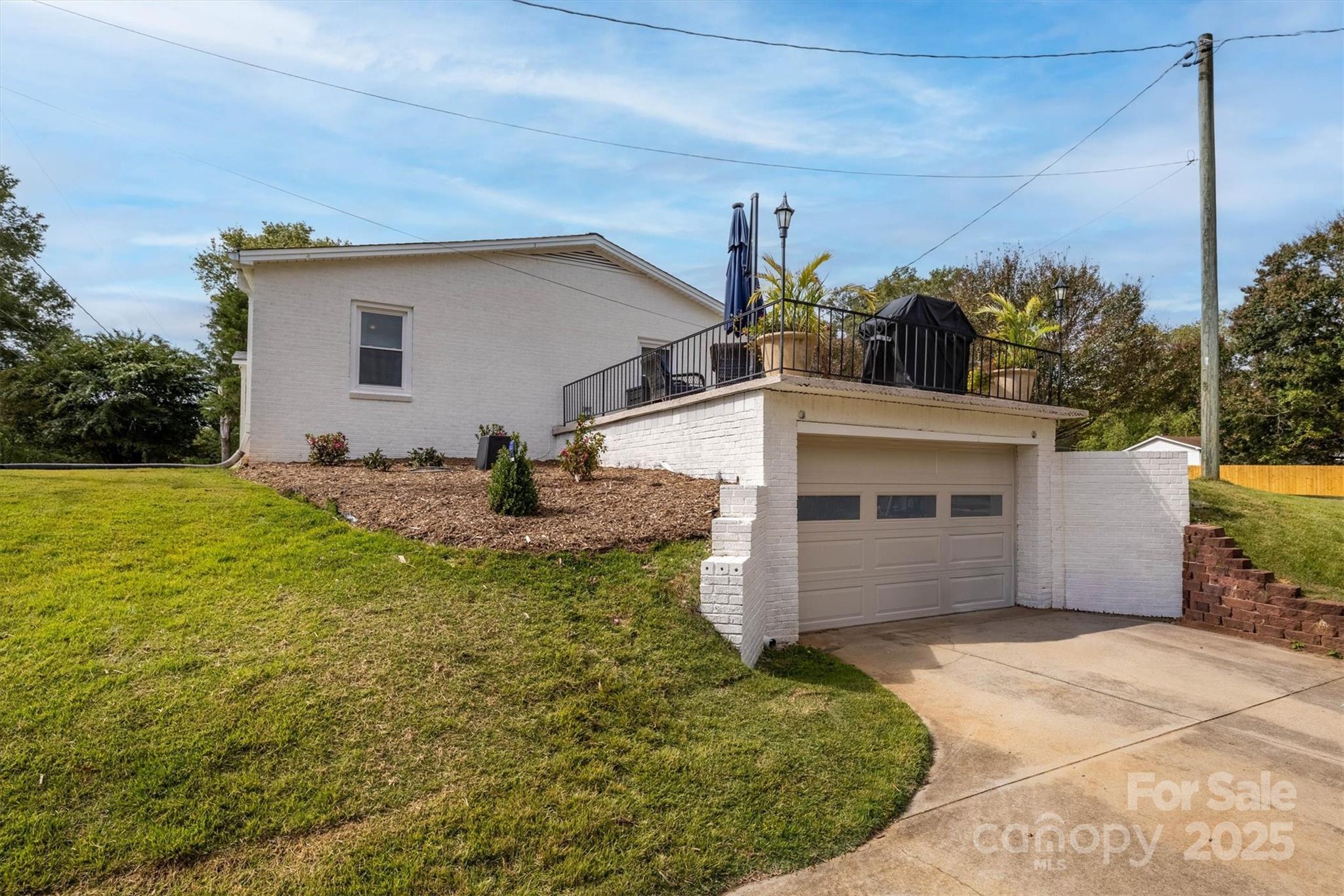 2625 20th St Lane Northeast Hickory, NC 28601 - Photo 5 of 31 a view of a house with backyard and garden