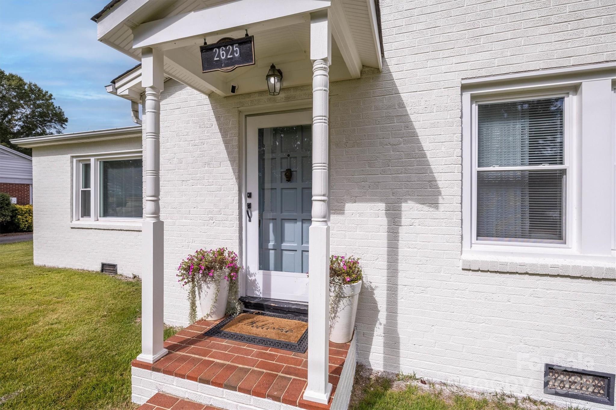 2625 20th St Lane Northeast Hickory, NC 28601 - Photo 9 of 31 a front view of a house with a yard