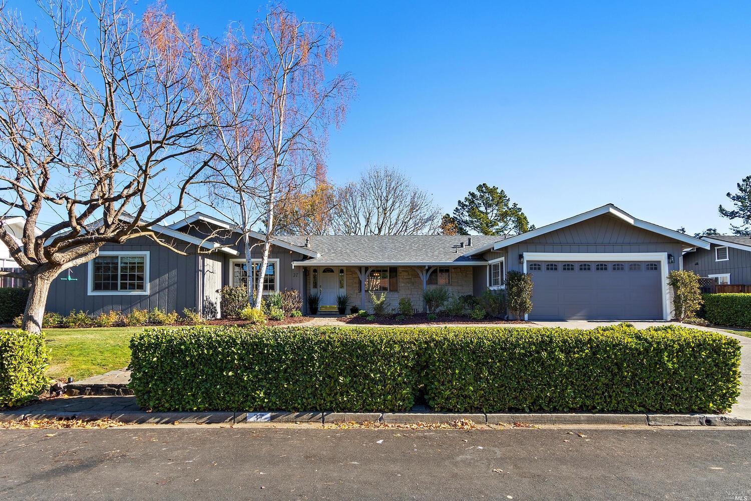 front view of a house with a small yard
