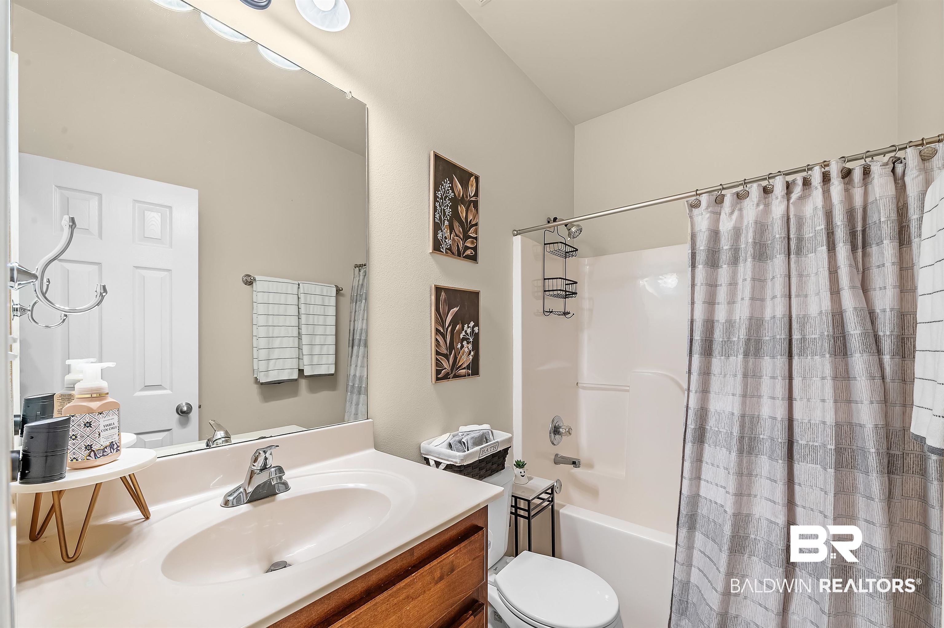 9376 Sable Court Daphne, AL 36526 - Photo 32 of 46 Full bathroom with toilet, shower / tub combo, and vanity