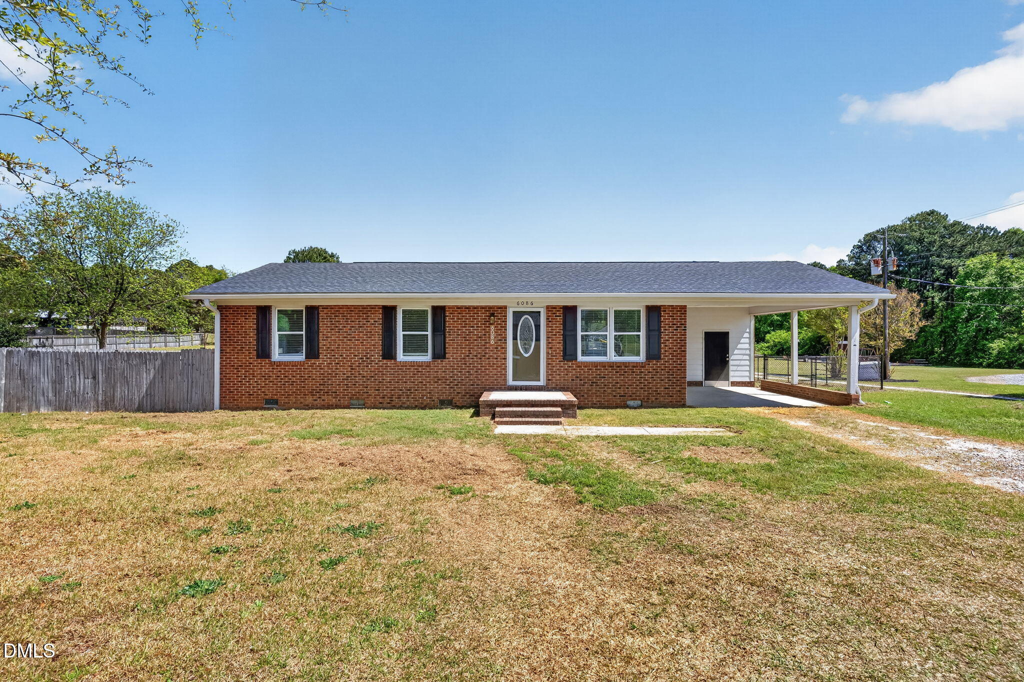 6086 Red Hill Church Road Coats, NC 27521 - Photo 2 of 44 a front view of a house with garden