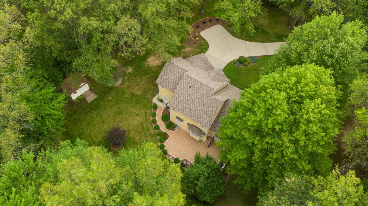 5964 West Schultz Road La Porte, IN 46350 - Photo 12 of 53 an aerial view of a house with a yard and trees all around