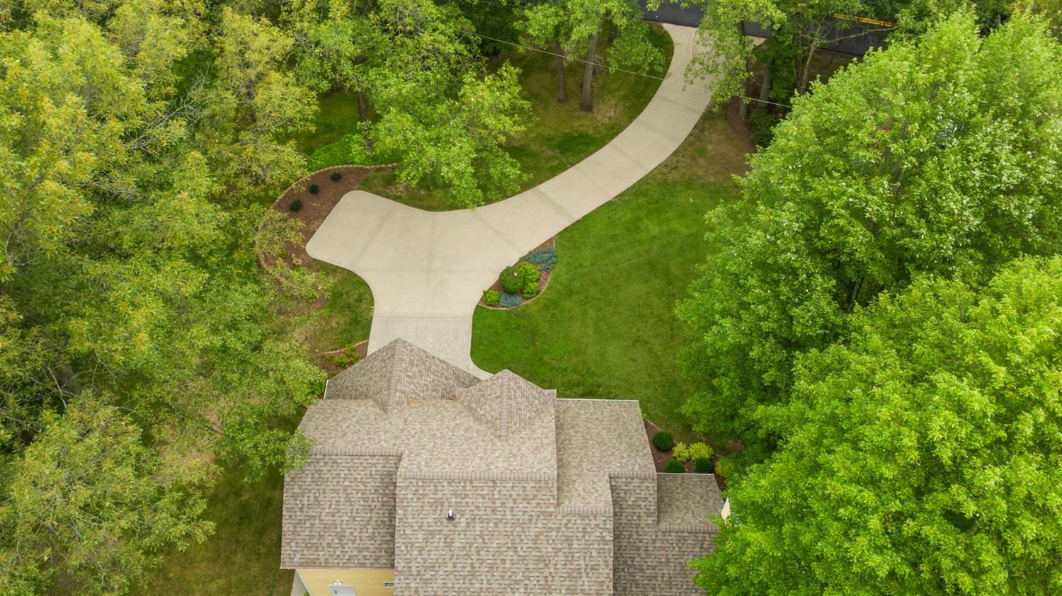 5964 West Schultz Road La Porte, IN 46350 - Photo 13 of 53 an aerial view of a house with a yard and trees all around
