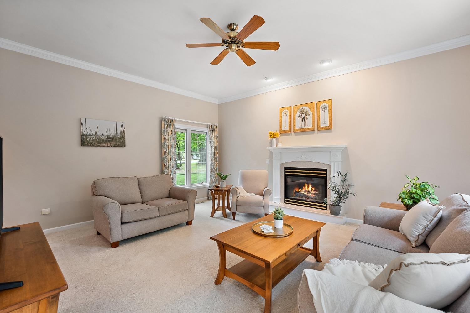 5964 West Schultz Road La Porte, IN 46350 - Photo 17 of 53 a living room with furniture a fireplace and a flat screen tv