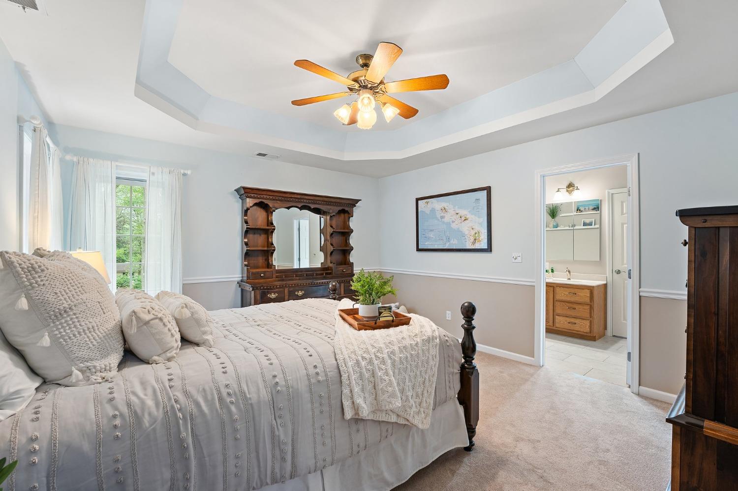 5964 West Schultz Road La Porte, IN 46350 - Photo 31 of 53 a bedroom with a bed and a chandelier