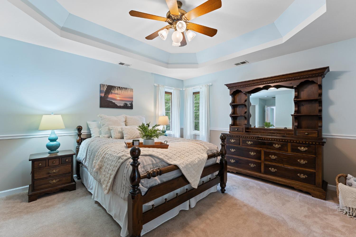 5964 West Schultz Road La Porte, IN 46350 - Photo 32 of 53 a bedroom with a bed and a chandelier