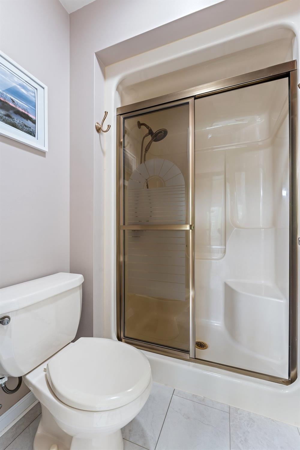 5964 West Schultz Road La Porte, IN 46350 - Photo 37 of 53 a bathroom with a toilet and a shower