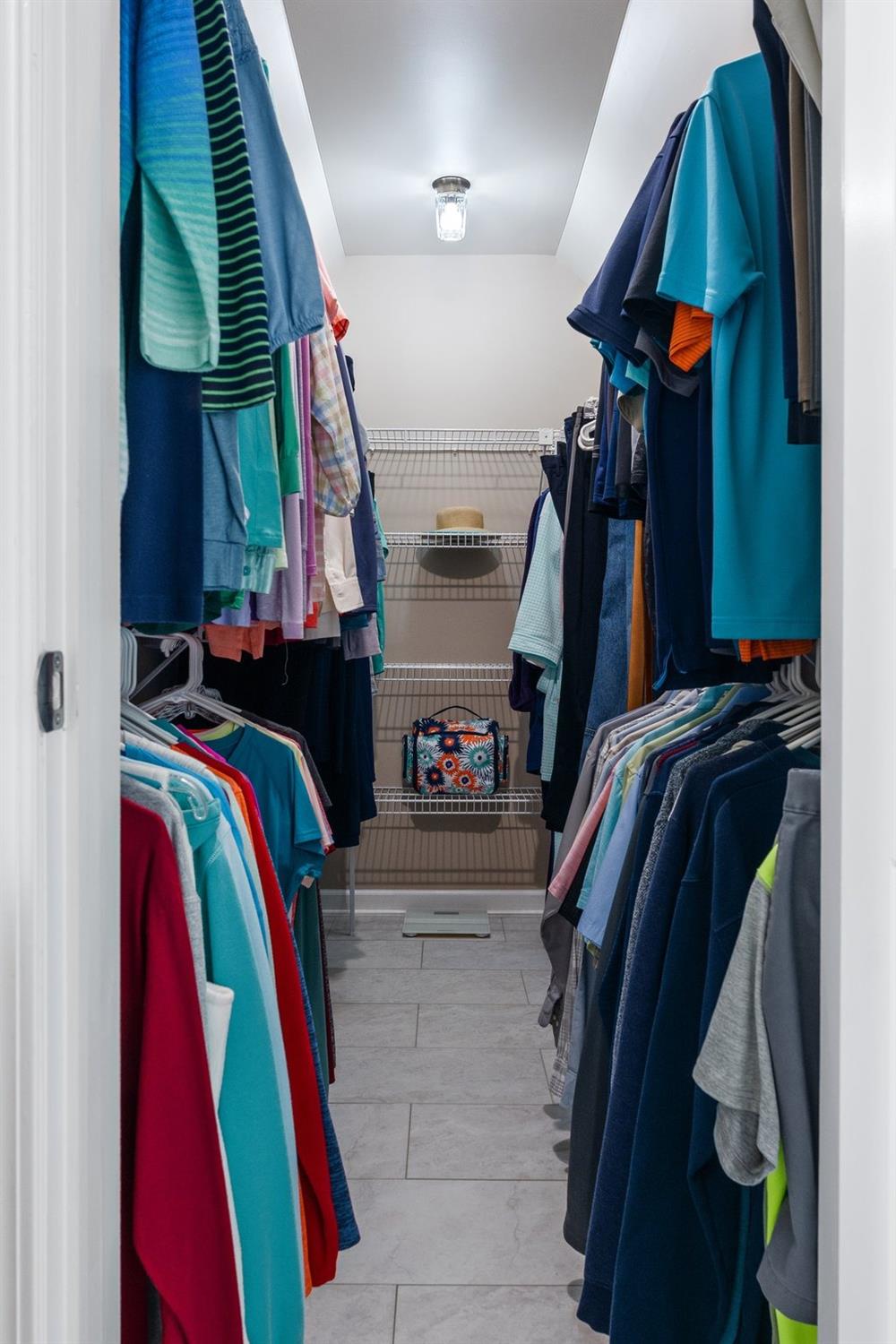5964 West Schultz Road La Porte, IN 46350 - Photo 38 of 53 a view of walk in closet with clothes and shoes