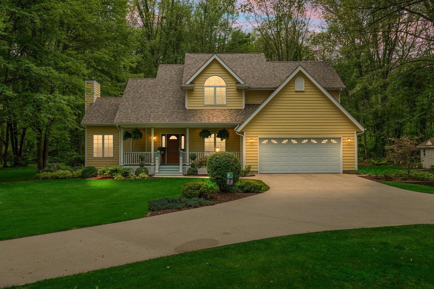 5964 West Schultz Road La Porte, IN 46350 - Photo 5 of 53 a front view of a house with a yard and garage