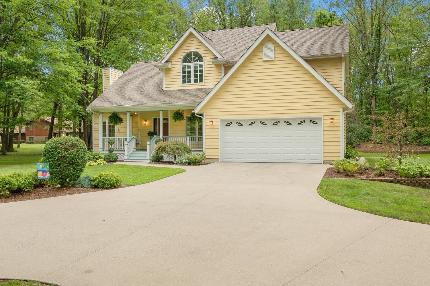 5964 West Schultz Road La Porte, IN 46350 - Photo 6 of 53 a view of front a house with a yard and potted plants