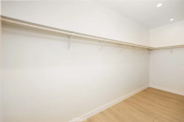 a kitchen with appliances a sink and cabinets