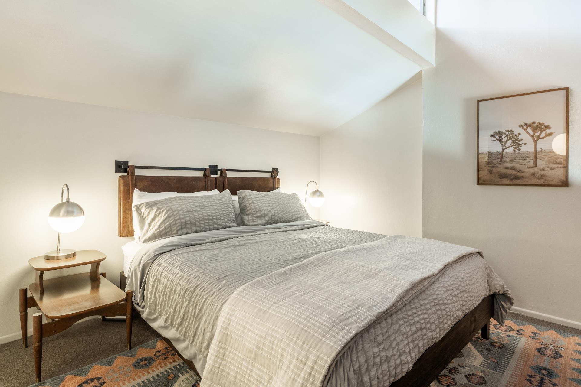137 Laurel Mountain Road, Unit 227 Mammoth Lakes, CA 93546 - Photo 16 of 28 Bedroom with carpet floors and lofted ceiling