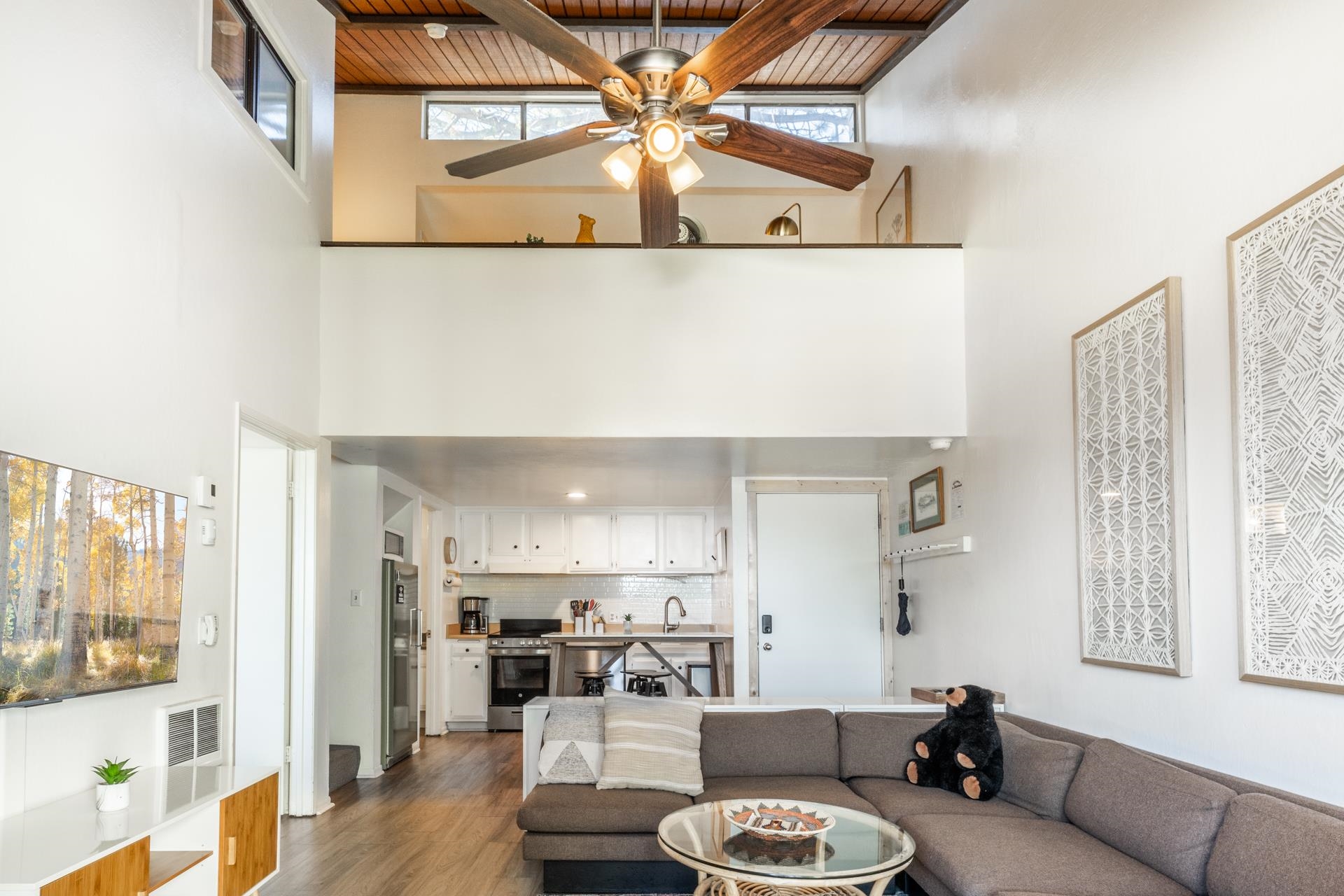 137 Laurel Mountain Road, Unit 227 Mammoth Lakes, CA 93546 - Photo 5 of 28 Living area featuring ceiling fan, dark wood finished floors, and wood ceiling