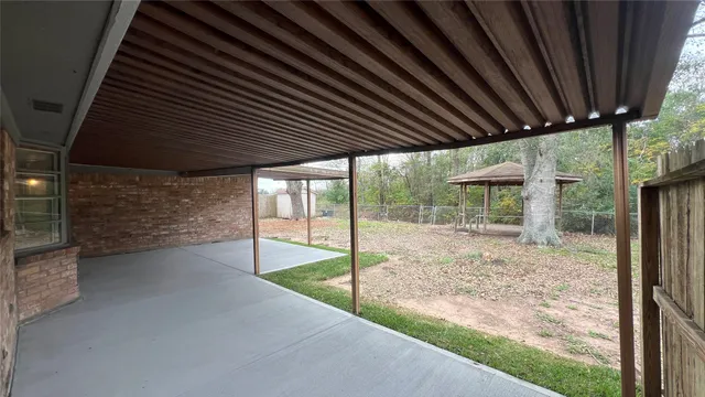 a view of an empty room with a balcony