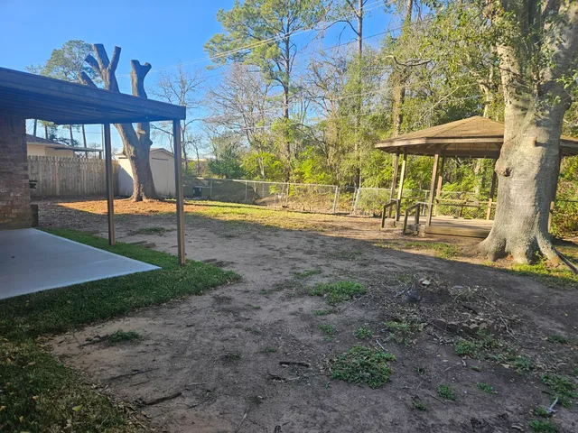 a view of a porch with a backyard