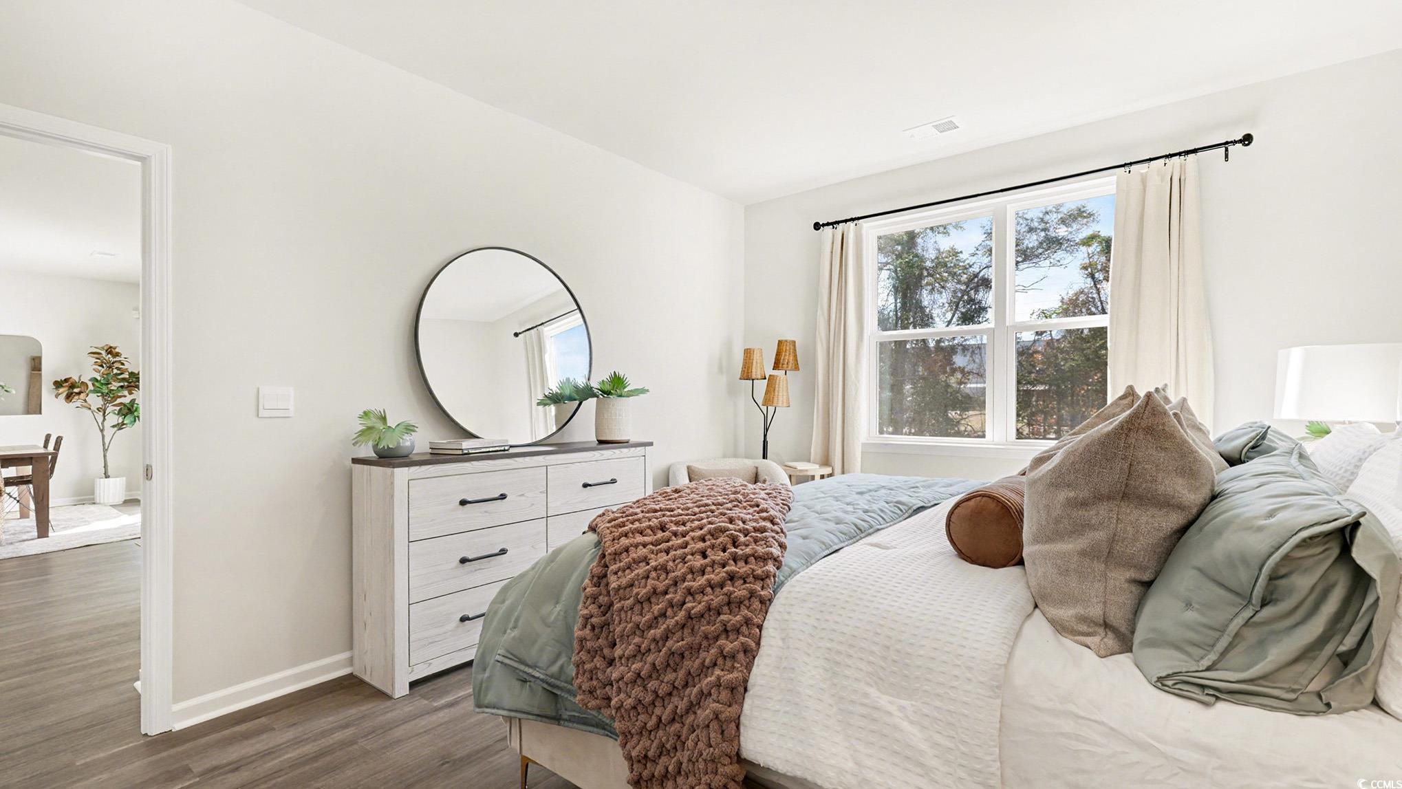 312 RookRoost Circle Conway, SC 29526 - Photo 18 of 29 Bedroom with baseboards and wood finished floors