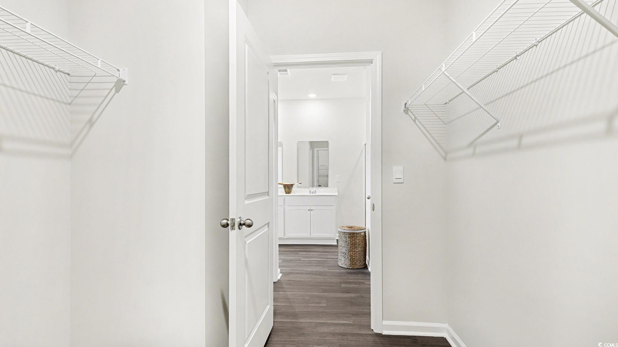 312 RookRoost Circle Conway, SC 29526 - Photo 21 of 29 Spacious closet featuring dark wood finished floors