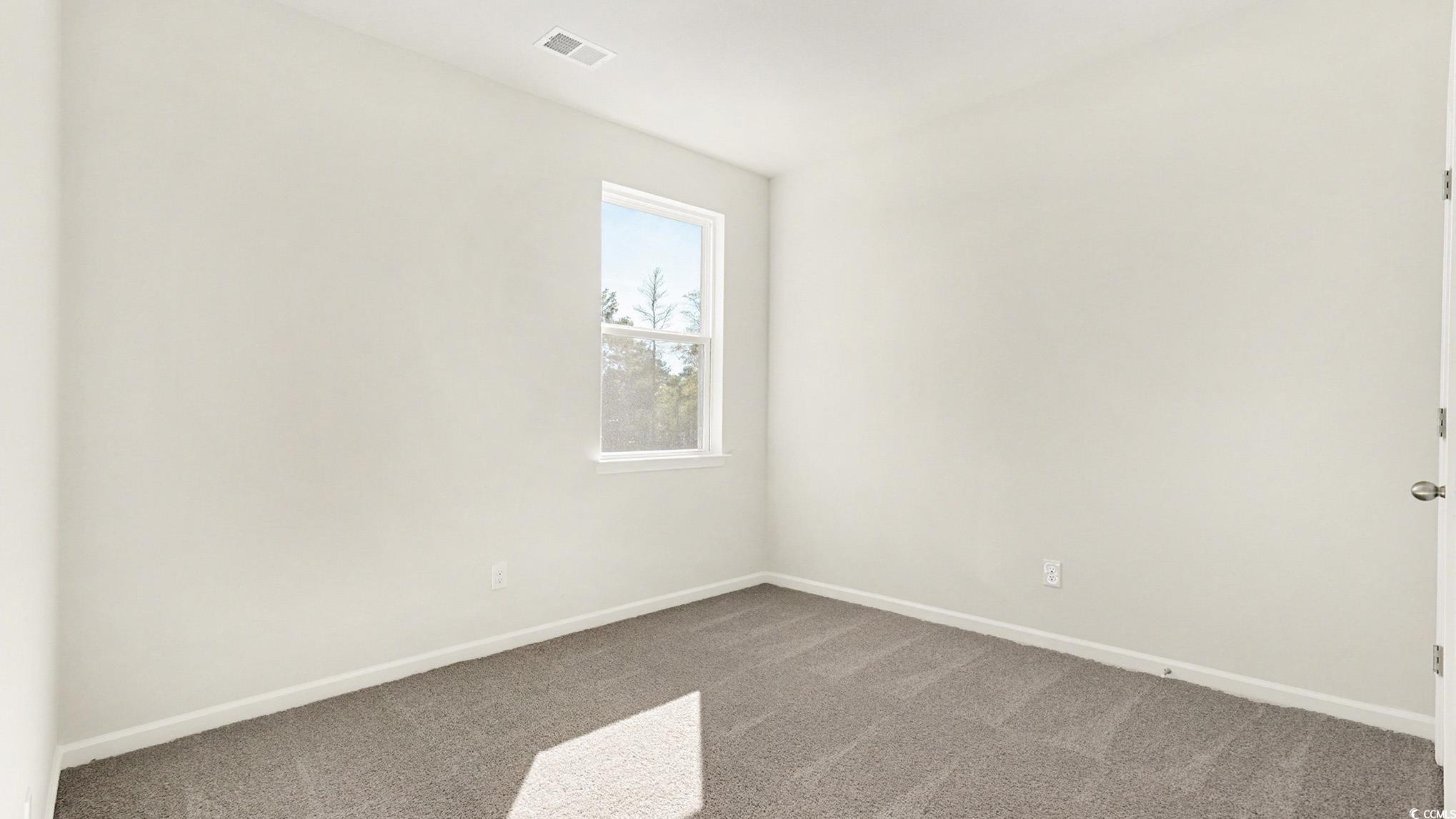 312 RookRoost Circle Conway, SC 29526 - Photo 22 of 29 Carpeted empty room featuring baseboards