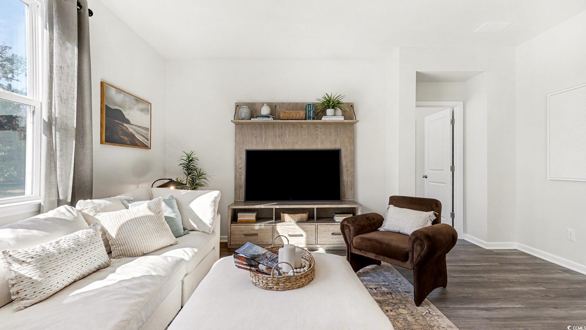 312 RookRoost Circle Conway, SC 29526 - Photo 6 of 29 Living room featuring wood finished floors and baseboards