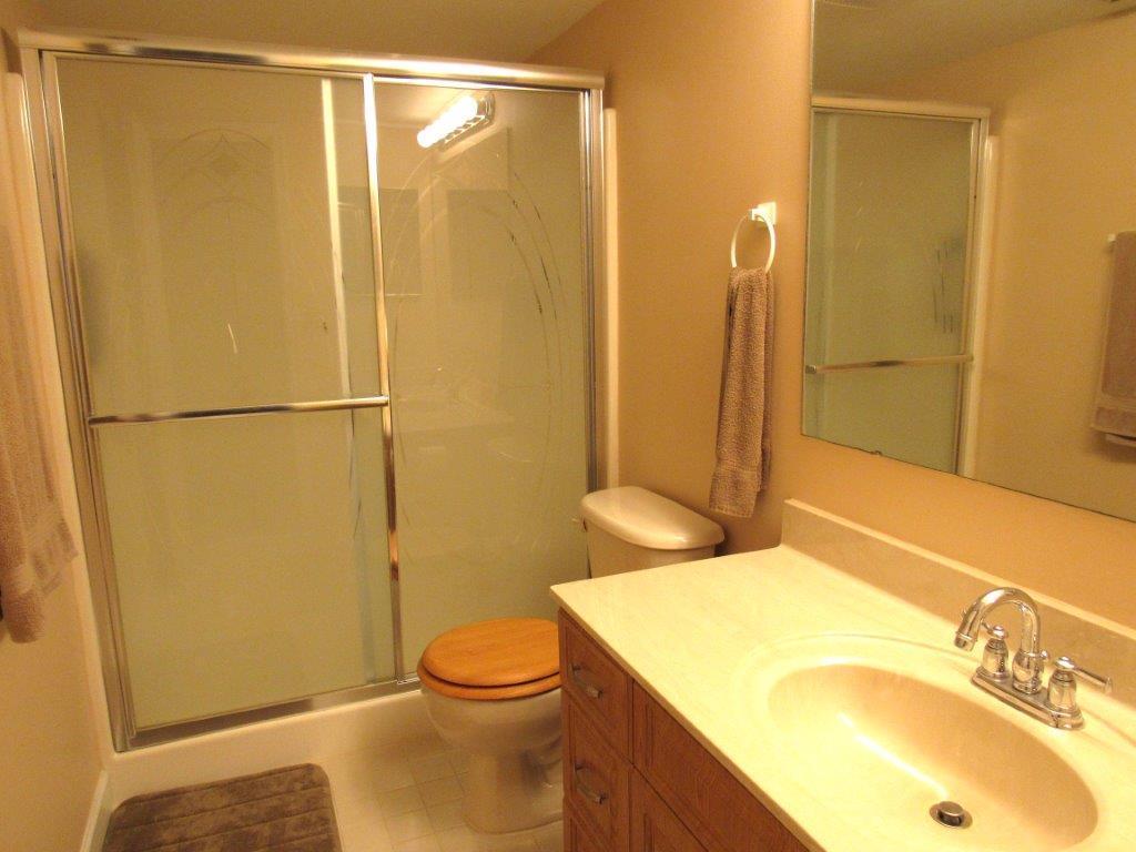 1841 Southwest Palm City Road, Unit 401D Stuart, FL 34994 - Photo 12 of 19 master bath