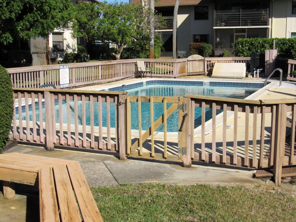 1841 Southwest Palm City Road, Unit 401D Stuart, FL 34994 - Photo 14 of 19 heated pool