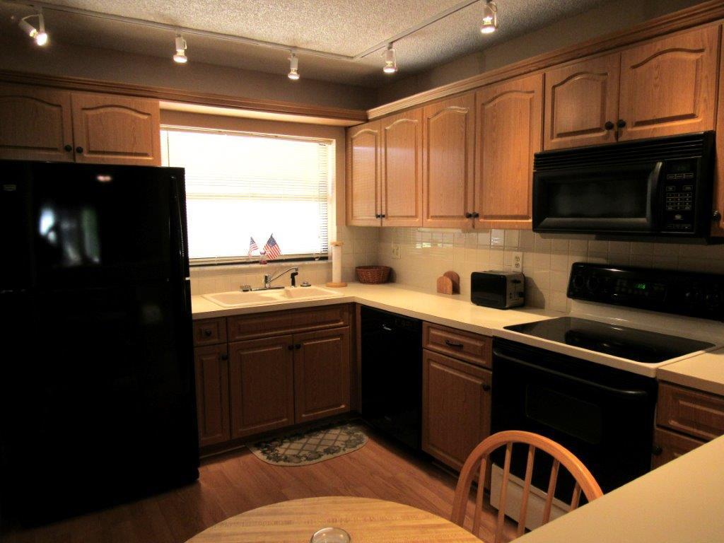 1841 Southwest Palm City Road, Unit 401D Stuart, FL 34994 - Photo 2 of 19 Kitchen