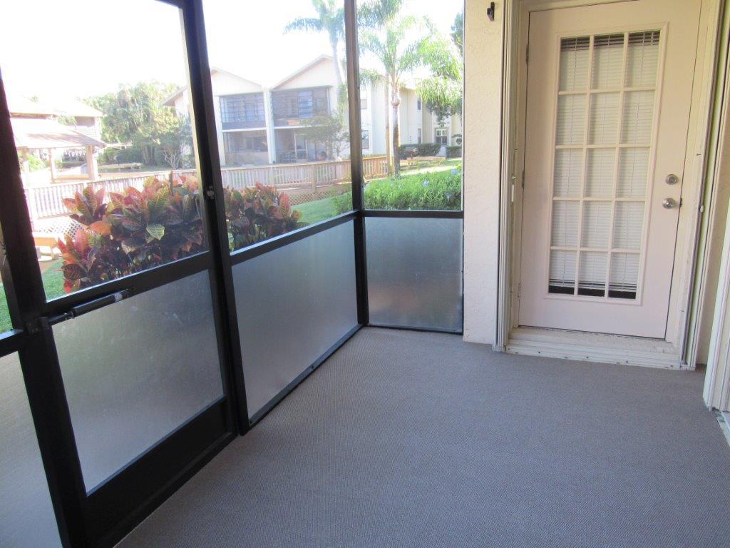 1841 Southwest Palm City Road, Unit 401D Stuart, FL 34994 - Photo 10 of 19 screened porch