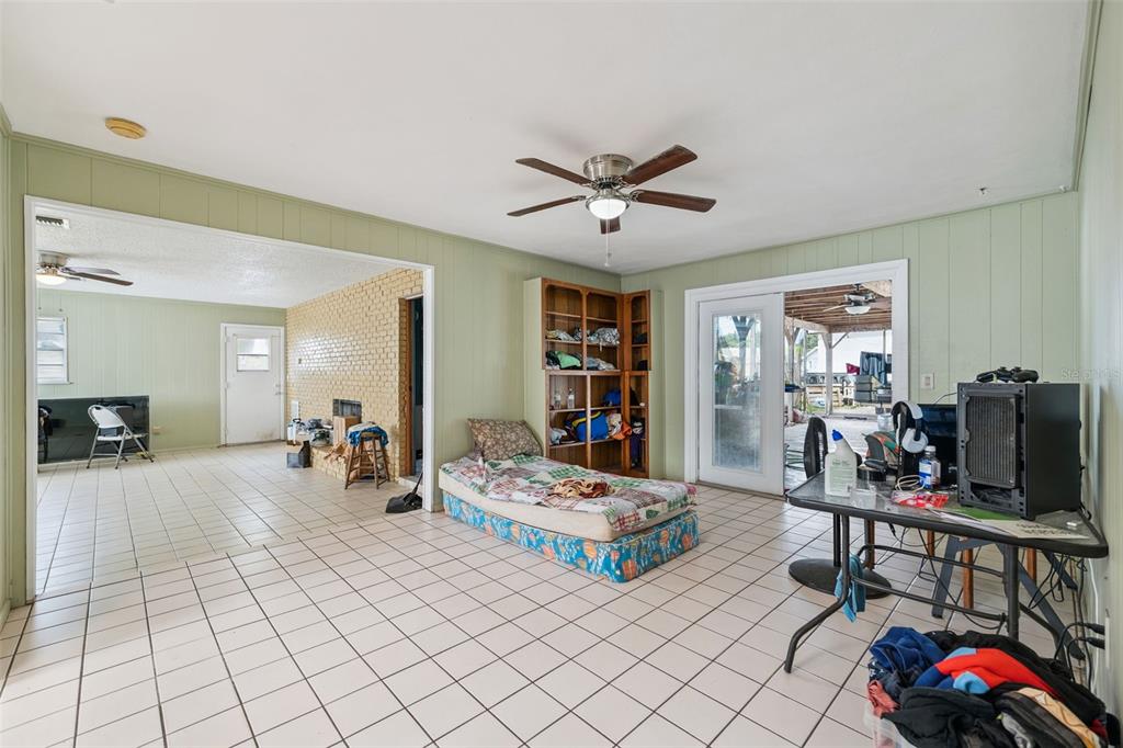 116 Hampden Road Winter Haven, FL 33884 - Photo 4 of 19 a living room with furniture and flat screen tv