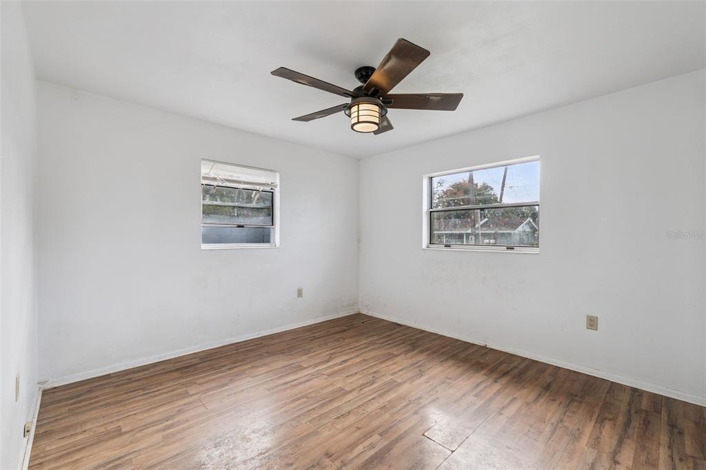 116 Hampden Road Winter Haven, FL 33884 - Photo 9 of 19 a view of a ceiling fan with wooden floor