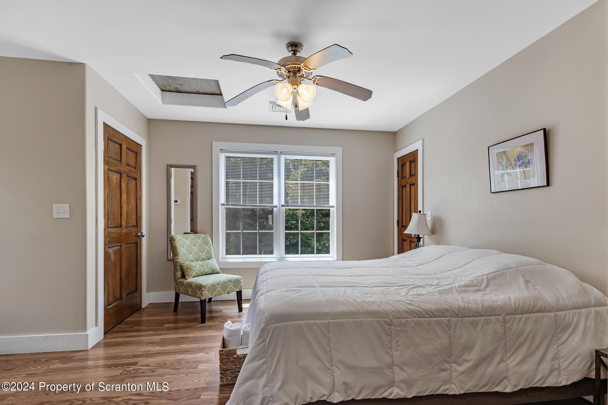 3315 State Rte 2012 Union Dale, PA 18470 - Photo 54 of 86 a bedroom with a bed and a window