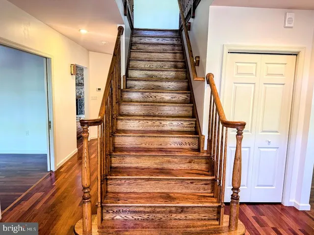 a kitchen with stainless steel appliances granite countertop sink stove and cabinets