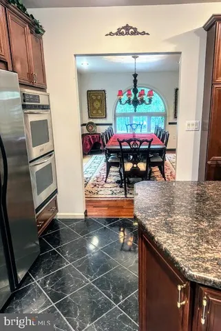 a bathroom with a tub and a shower