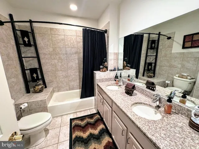 a view of a street with a tree