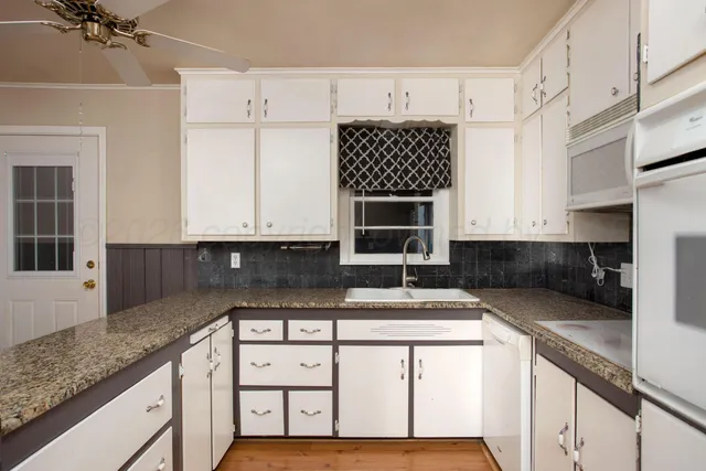 a view of a kitchen cabinets