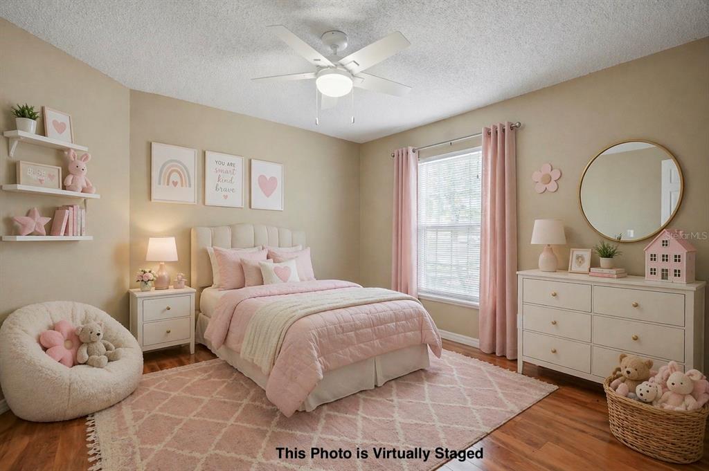 5277 Deltona Boulevard Spring Hill, FL 34606 - Photo 41 of 74 a bedroom with two beds and a dresser