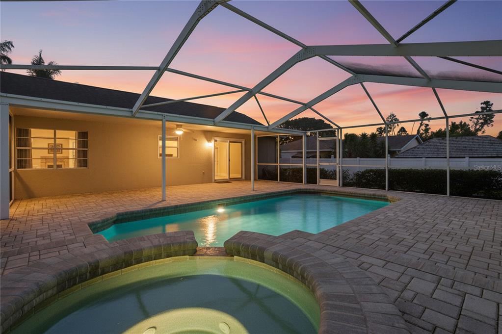 5277 Deltona Boulevard Spring Hill, FL 34606 - Photo 51 of 74 a view of a swimming pool with a patio