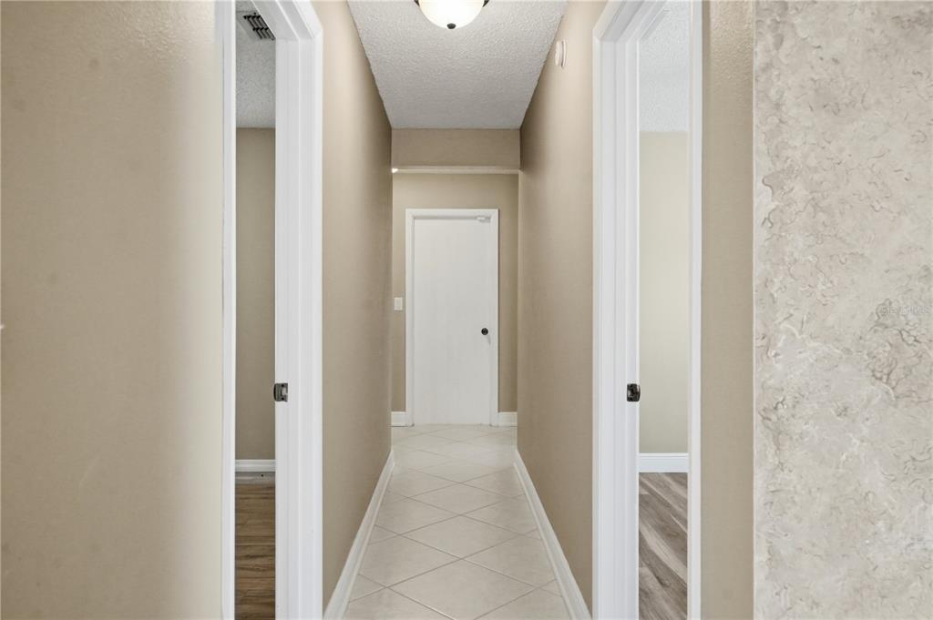 5277 Deltona Boulevard Spring Hill, FL 34606 - Photo 6 of 74 a view of a hallway