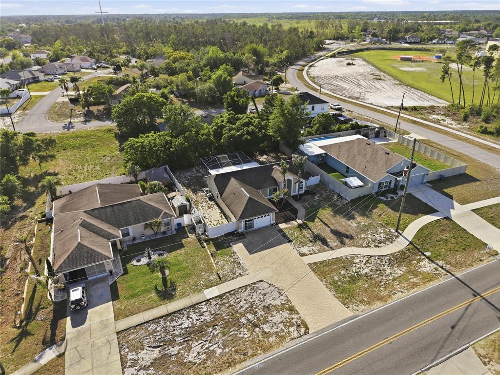 5277 Deltona Boulevard Spring Hill, FL 34606 - Photo 65 of 74 an aerial view of a house with a ocean view