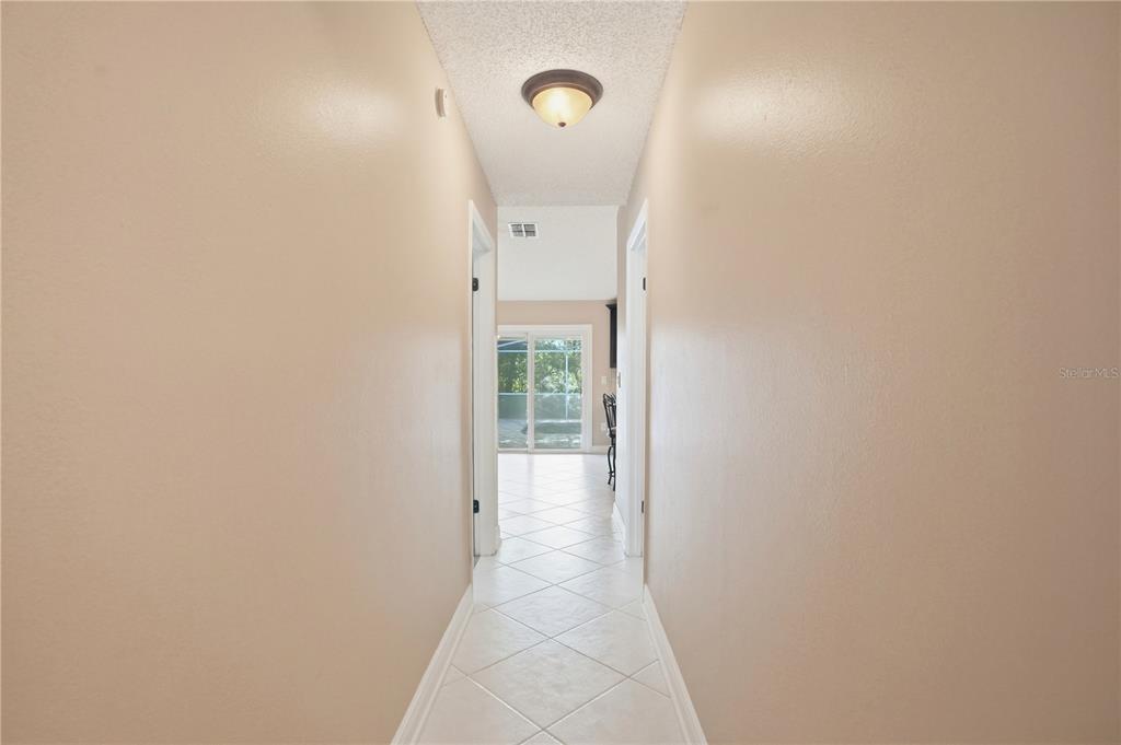 5277 Deltona Boulevard Spring Hill, FL 34606 - Photo 7 of 74 a view of a hallway
